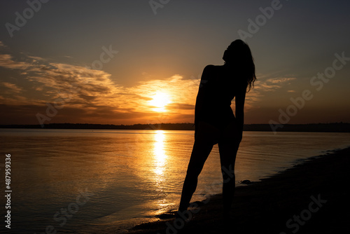  Woman silhouette at sunset