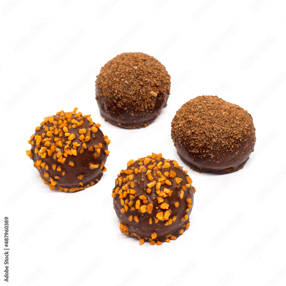 Two kinds of petit fours cakes isolated on white background Two kinds of petit fours cakes isolated on white background