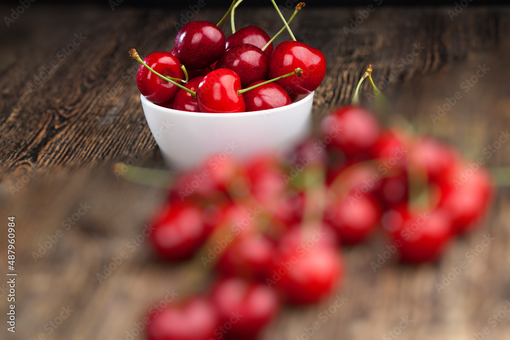 red ripe sweet cherries on a wooden table red ripe sweet cherries on a wooden table