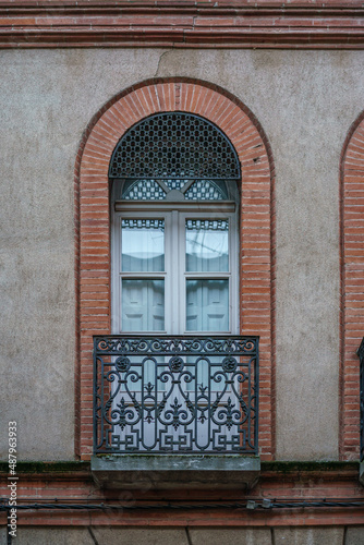 Fototapeta Naklejka Na Ścianę i Meble -  Traditional European buildings facade of glass windows