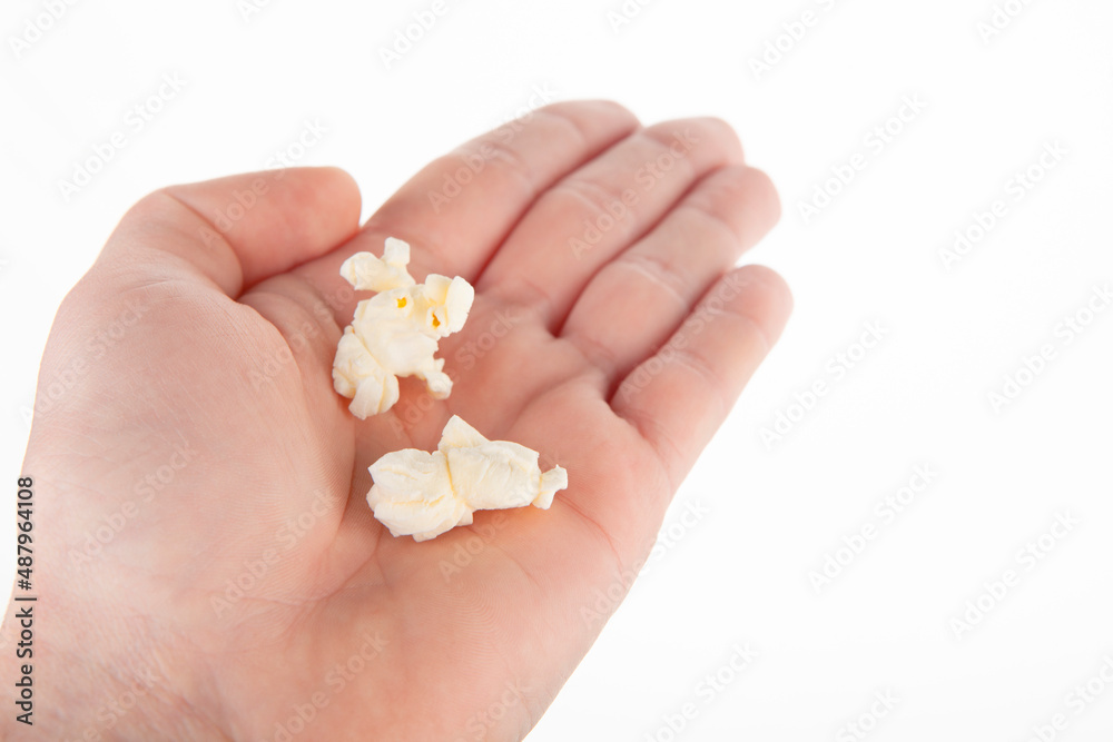 image of pop corn hand white background image of pop corn hand white background