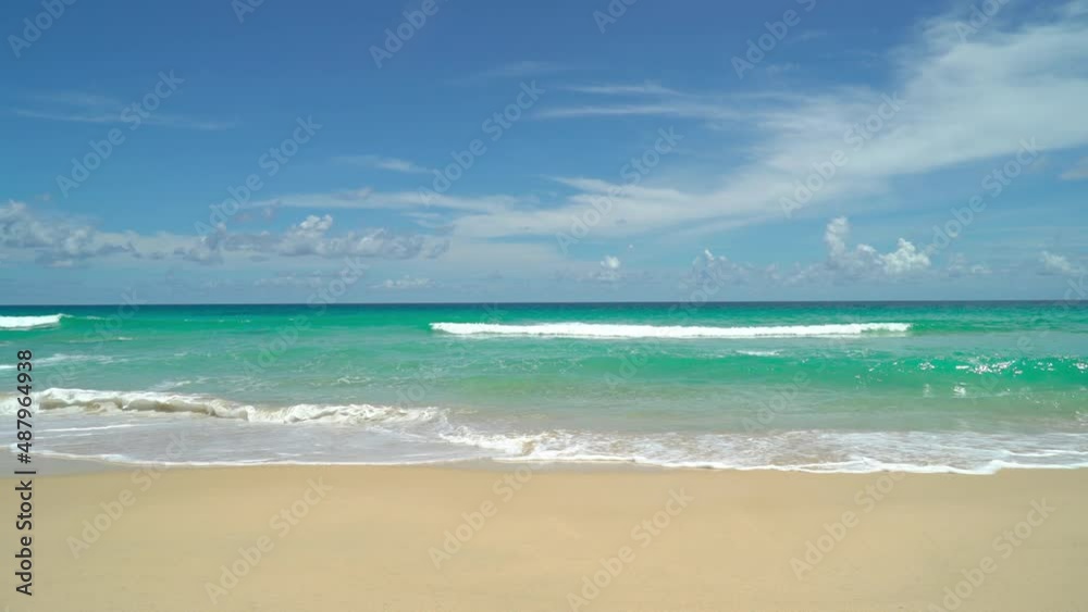 Phuket, Thailand. Beach sea sand and sky. Landscape view of beach sea sand and sky in summer day. Beach space area. At Surin Beach, Phuket, Thailand. On 14 Jan 2022. 4K UHD. Video Clip Phuket, Thailand. Beach sea sand and sky. Landscape view of beach sea sand and sky in summer day. Beach space area. At Surin Beach, Phuket, Thailand. On 14 Jan 2022. 4K UHD. Video Clip
