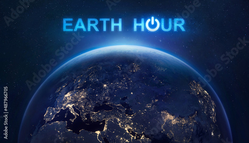 Fototapeta Naklejka Na Ścianę i Meble -  Earth Hour 2022 event. Planet Earth at night in outer space. Turn off your lights for save climate. Elements of this image furnished by NASA