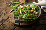 Arugula salad with couscous and tomatoes