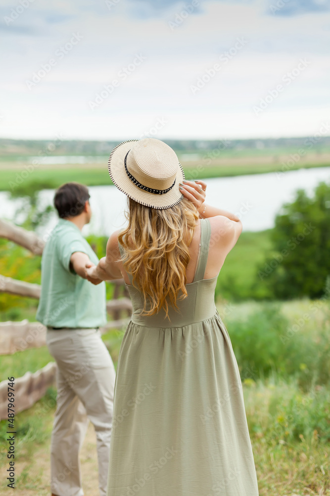 Happy Young adult Couple enjoying a walking outdoor