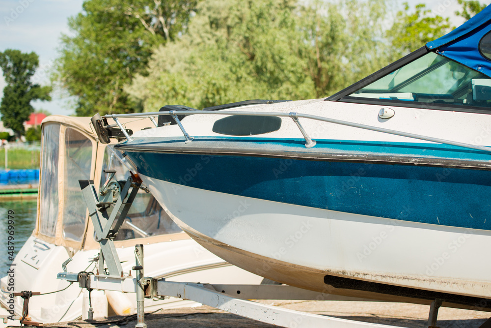 Fototapeta premium Stern of a motor yacht on slipways, close-up