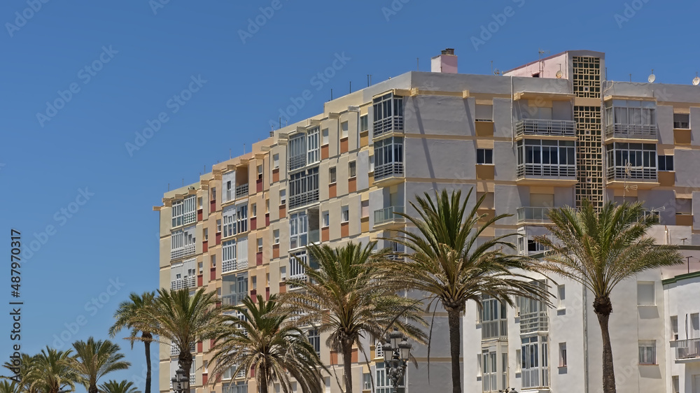 Modern apartment buildings in pastel colors in Cadiz, Andalusia, Spain