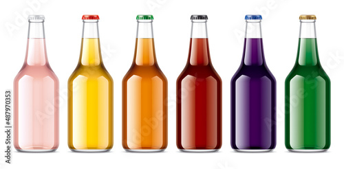 Set of Glass Bottles with transparent Juices.  