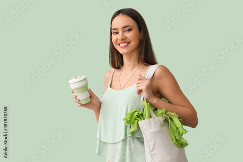 Young woman with eco bag an...