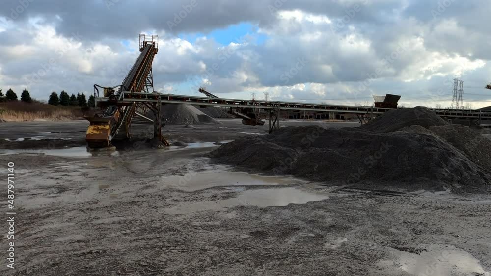 Limestone gravel pit conveyor and tailing pile, in Southeast Michigan - Shot in 4K Limestone gravel pit conveyor and tailing pile, in Southeast Michigan - Shot in 4K