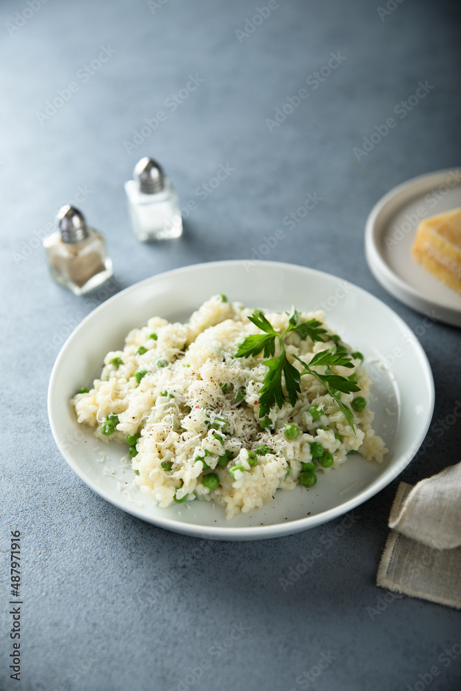 Traditional Italian risotto with green pea Traditional Italian risotto with green pea