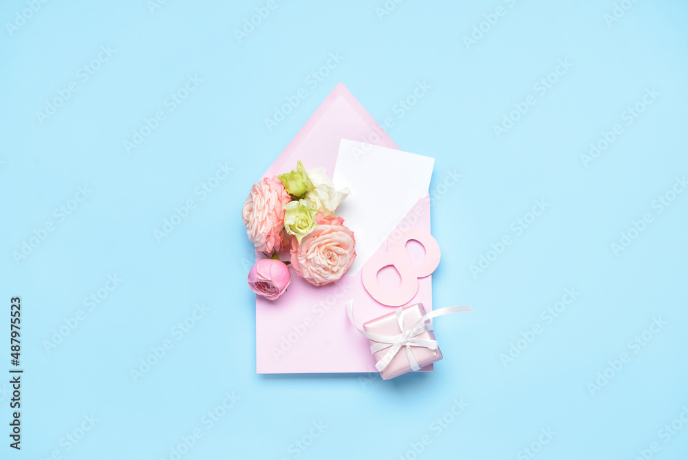Composition with card, gift box and flowers on color background. International Women's Day celebration Composition with card, gift box and flowers on color background. International Women's Day celebration