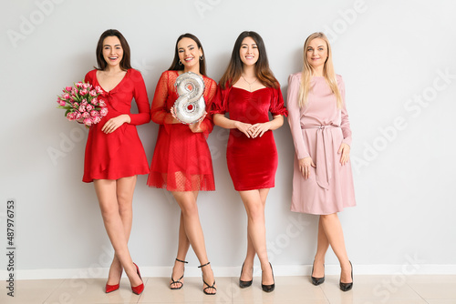 Beautiful women with bouque...