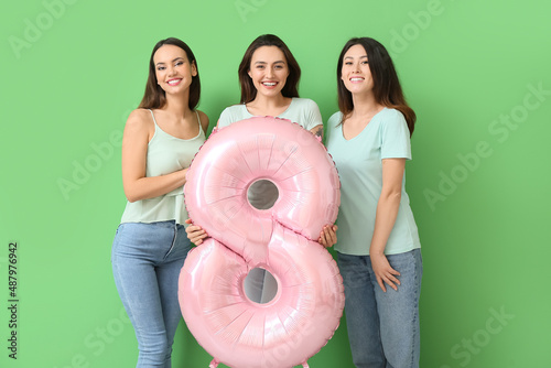 Beautiful women with balloo...