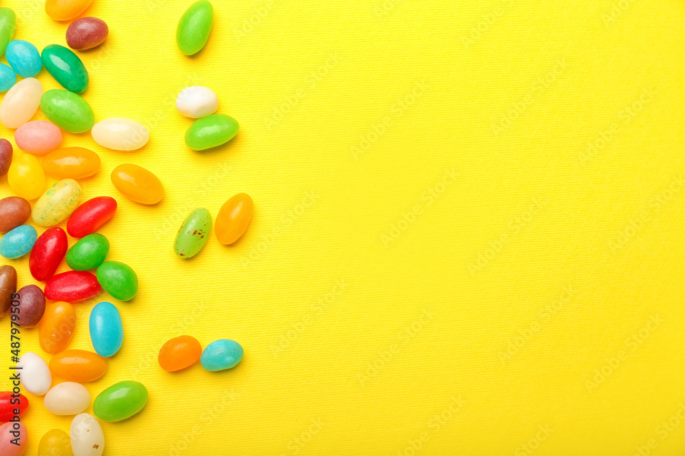 Different jelly beans on yellow background Different jelly beans on yellow background