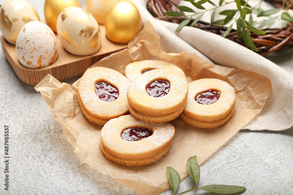 Tasty cookies in shape of eggs on light background Tasty cookies in shape of eggs on light background