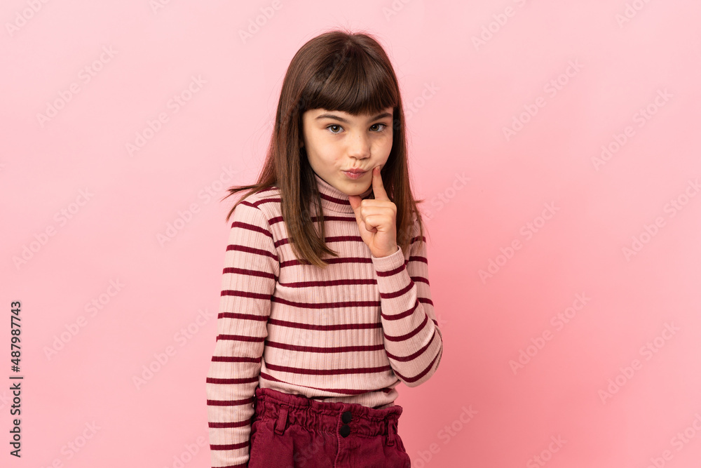Little girl isolated on pink background and thinking Little girl isolated on pink background and thinking