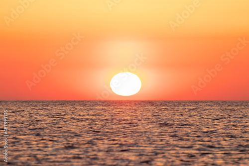 Fototapeta Naklejka Na Ścianę i Meble -  sun rising at dawn over the mediterranean sea on the costa brava