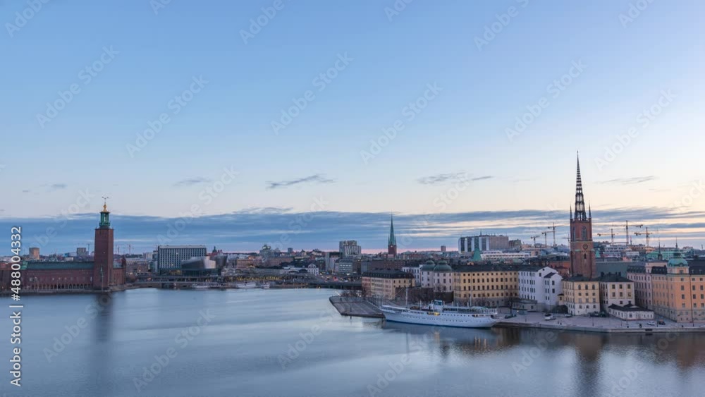 Stockholm Sweden time lapse 4K, city skyline night to day sunrise timelapse at City Hall and Gamla Stan Stockholm Sweden time lapse 4K, city skyline night to day sunrise timelapse at City Hall and Gamla Stan
