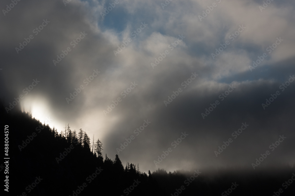Cloudy, moody landscape of the mountains along the coast of southeast Alaska, USA. Cloudy, moody landscape of the mountains along the coast of southeast Alaska, USA.