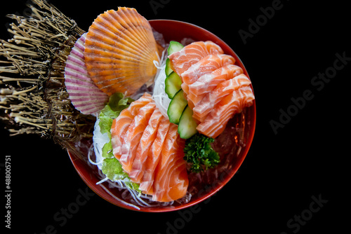 Die cut of fresh sasimi salmon Popular Japanese food on black isolated