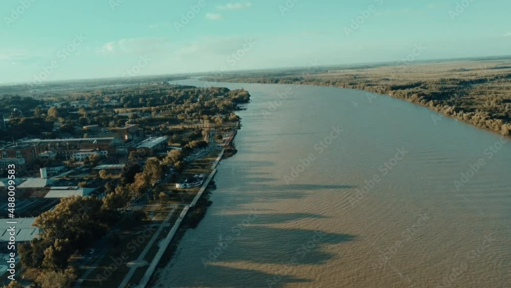 Coastline coastal over river and park to horizon sky aerial fly drone <> Argentina Buenos Aires Zarate Coastline coastal over river and park to horizon sky aerial fly drone <> Argentina Buenos Aires Zarate