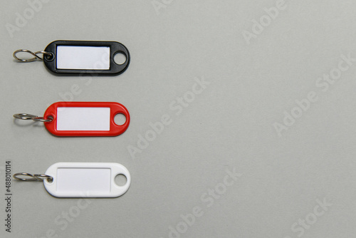 three key holder with space for text, grey background with negative space
