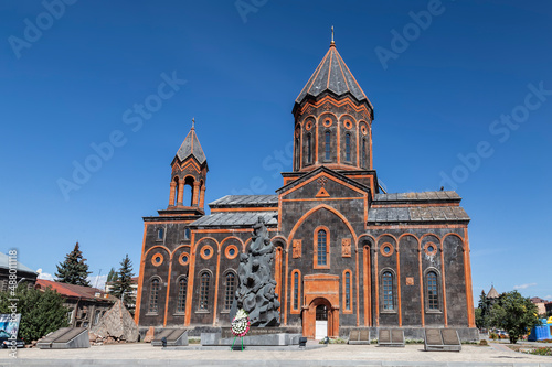 View of the Armenian Apostolic Church of the Holy Saviour and the monument to those killed in the devastating earthquake of 1988. Gyumri, Armenia
