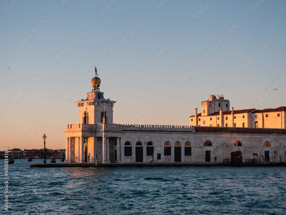 Punta della Dogana or Dogana da Mar Building in Venice, Italy with Atlas Statues and Golden Globe