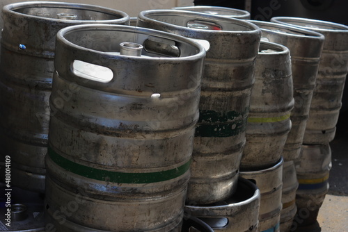 Steel beer barrel kegs outside pub