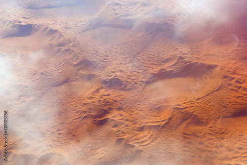 Aerial view on sand dunes of a desert.