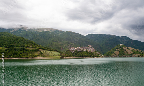 Landscape of Castel di TOra and Borgo Monte Antuni on Lake Turano, Lazio, Italy, during a cloudy day