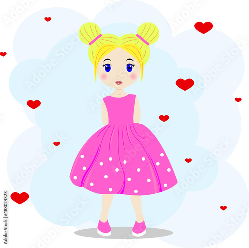 Little cute blonde girl in a pink dress with white polka dots