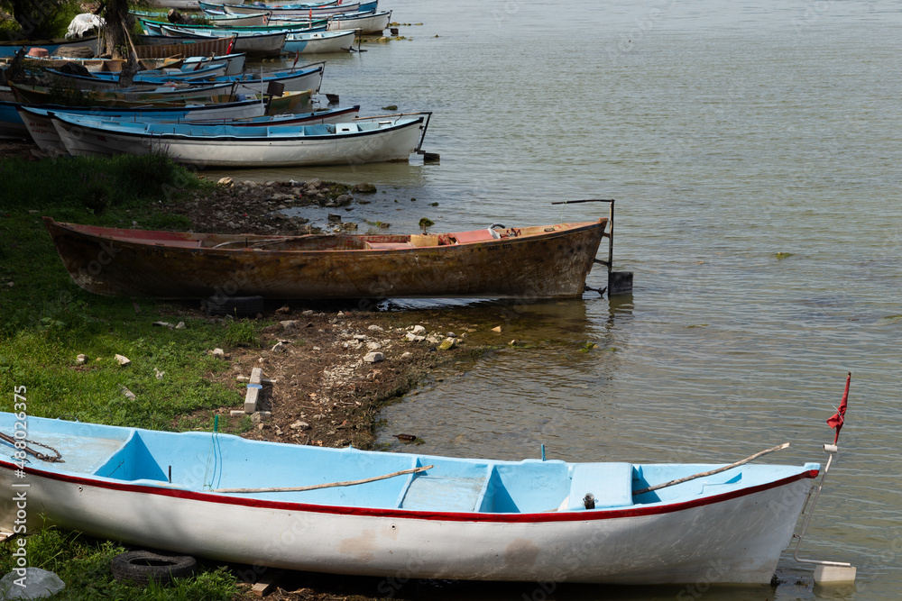 fishing boats by the lake