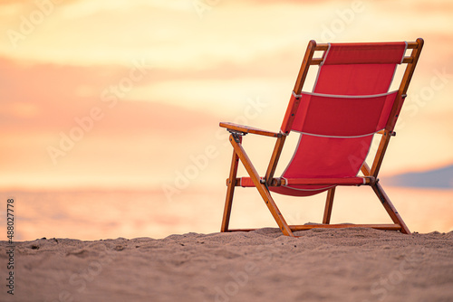 Chair at sunset on beach in Santa Monica