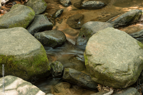 Rocks in a slow moving stream.