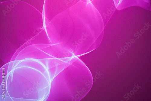 Neon abstract led lines on a magenta background. Fluorescent synthwave backdrop.