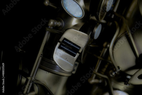 vintage gold alto saxophone musical instrument background