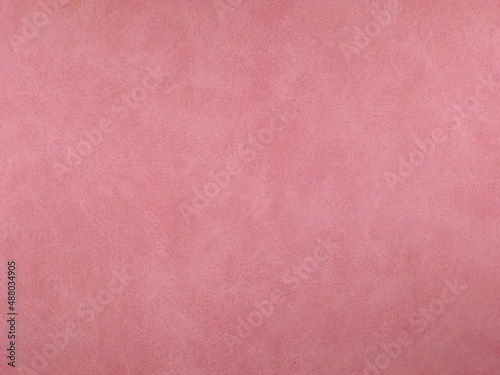 Pink suede surface textured as a background. High quality photo