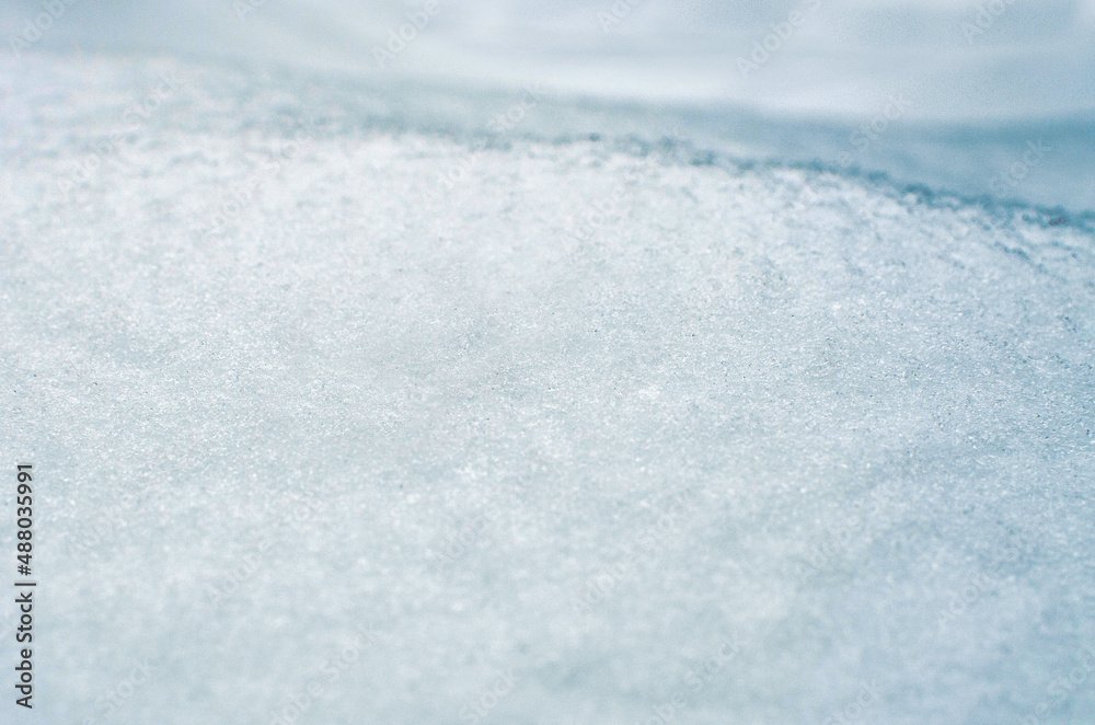 Obraz premium Abstract background with snow texture. Natural winter background for design, web.