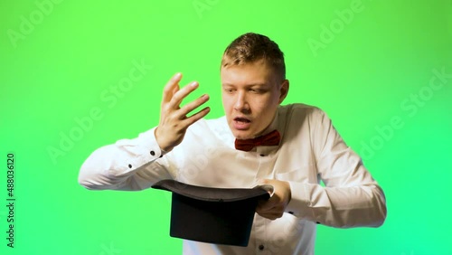 young man magician trickster hat loser fail deceit no magic training didn't work chromakey