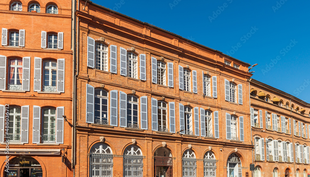 Typical facades of Saint Etienne square in Toulouse, Haute Garonne, Occitanie, France