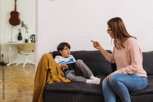 mother scolding her kid