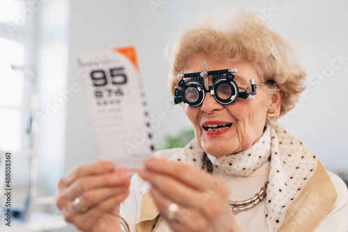 the older woman has an ophthalmologic examination
