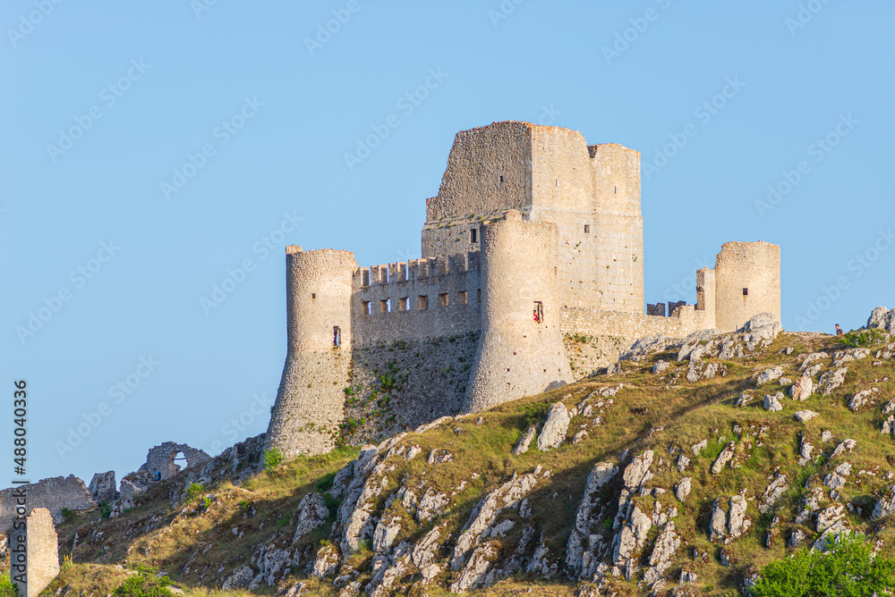 Castle ruins at Rocca Calascio italian travel destination, landmark in the Gran Sasso National Park, Abruzzo, Italy. Clear blue sky
