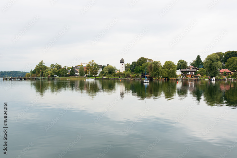Mirror-smooth lake in front of the Fraueninsel in the Chiemsee
