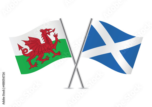 Wales and Scotland crossed flags. Welsh and Scottish flags, isolated on white background. Vector icon set. Vector illustration.