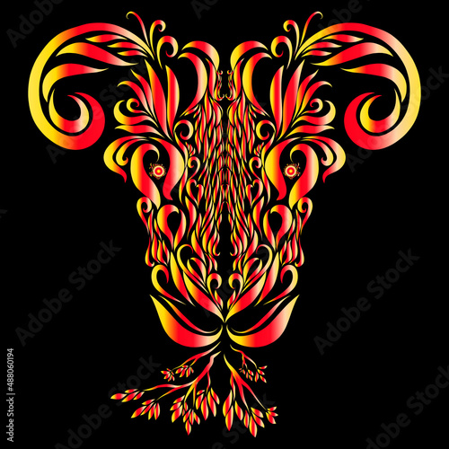 goat with graceful elegant curved yellow and red horns on a dark background