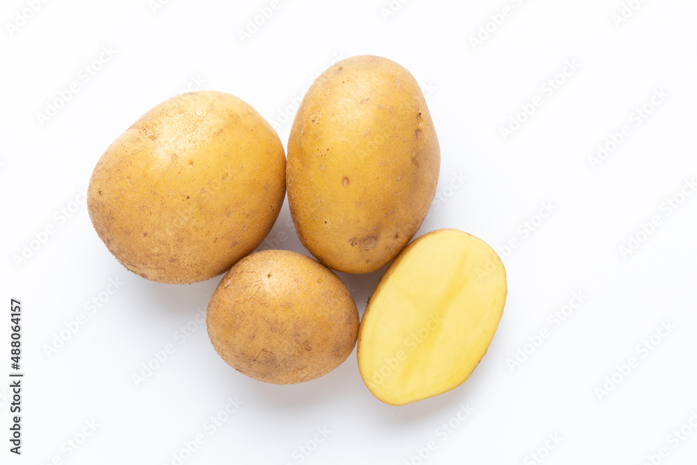 Potatoes isolated on white background. Flat lay. Top view. Potatoes isolated on white background. Flat lay. Top view.