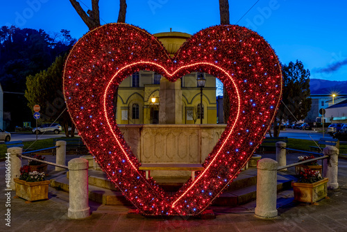A big red heart with colored lights in the center of the village, to celebrate Valentine's Day, Vicopisano, Pisa, Italy